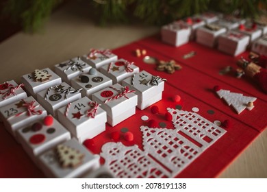 Original advent calendar made of jewelry boxes and a binder like open book, New Year craft, diy. Magic moment premonition, seasonal activity, Christmas miracle. Soft focus, depth of field - Shutterstock ID 2078191138