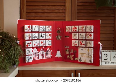 Original advent calendar made of jewelry boxes and a binder, New Year craft, diy. Magic moment premonition, seasonal activity, Christmas miracle. Soft focus, depth of field - Shutterstock ID 2078191186