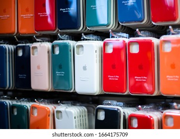 Original cases for iPhone 11 Pro. Colorful Phone Cases For Sale In Mobile Phones Stores. Apple accessories. Apple iPhone colorful soft touch cases. Kiev, Ukraine 03.03.2020 - Shutterstock ID 1664175709