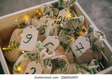 Original Christmas Advent Calendar For Children. Presents For Kids Fun In Fabric Bags In Wooden Box.