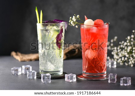 
Original colorful cocktails with fruits and berries at bar