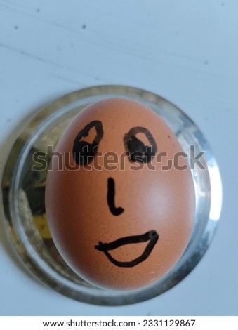 the original expression of egg, mode normal. face describes how we are forced to get used to a smile but are tired. spreading laughter maybe one of them

￼



