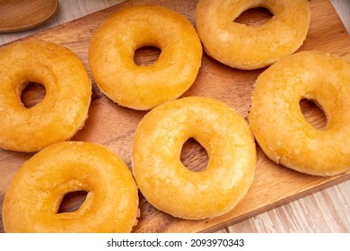 Original Flavor Donuts  Chocolate, Marmalade On Wooden Background. 