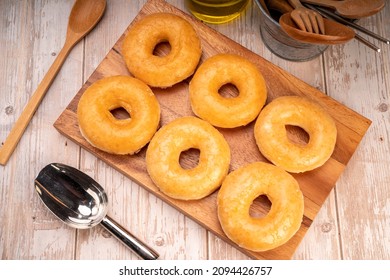 Original Flavor Donuts  Chocolate, Marmalade On Wooden Background. 