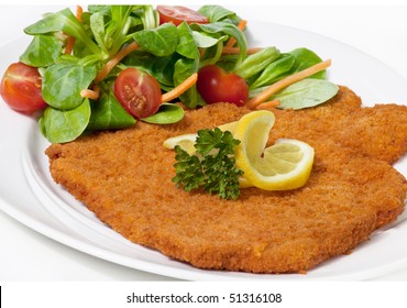 Original Fried Breaded Veal Viennese With Salad (could Be Either Veal, Pork Or Chicken Schnitzel)