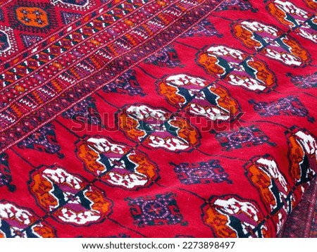 Original Turkmen tribal teke rug with the traditional Bukhara design