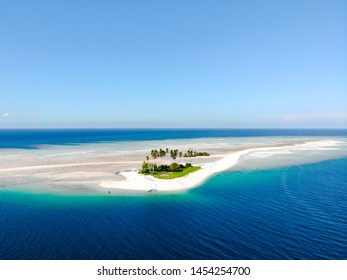 Originally called Manimbora island in East borneo, but the locals call this island "Spongebob island" instead. The resemblance from the sky is uncanny. 