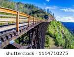 Originally one of 19 wooden railway trestle bridges built in the early 1900s in Myra Canyon, Kelowna, BC, it is now a public park with biking and hiking trails.