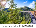 Originally one of 19 wooden railway trestle bridges built in the early 1900s in Myra Canyon, Kelowna, BC, it is now a public park with biking and hiking trails.