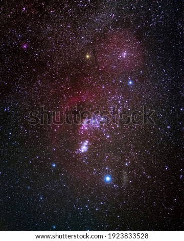 The Orion Molecular Cloud Complex showing its many colorful nebula alongside the Winter Milky Way, taken in Shenandoah National Park.