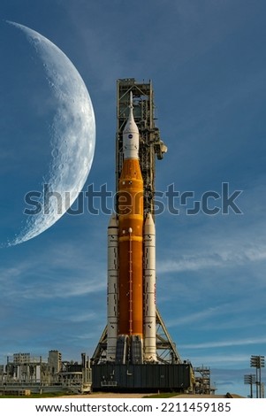 Orion spacecraft on launchpad on Moon background. Artemis space program to research solar system. Elements of this image furnished by NASA.