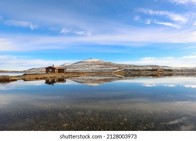 Orkel Norway 10202018 View  of the lake Orkel located in Oppdal municipality in central part of Norway. Typical norsk cabin for fishing and weekends tours