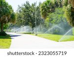 ORLANDO, FL, USA - 05 13, 2023: The University of Central Florida  (UCF)  high pressure irrigating system for gardening in summer