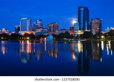 Orlando, FL USA July 13 A Full Moon And The Skyline Of Orlando,  Florida Are Reflected In The Waters Of Lake Eola