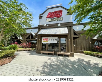 Orlando, FL USA - June 24, 2021:  The Front Exterior Of A Logan's Roadhouse In Orlando, Florida.