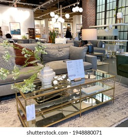 Orlando, FL USA- March 6, 2021 :  A Couch , Chair And Tables Display At A West Elm Midcentury Modern Furniture Store In Orlando, Florida.