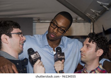 ORLANDO, FLORIDA - FEB. 24: Rap Artist MANN Attends The VIP All-Star Party Hosted By Dwight Howard And Adidas.  Feb. 24, 2012 In Orlando Florida.