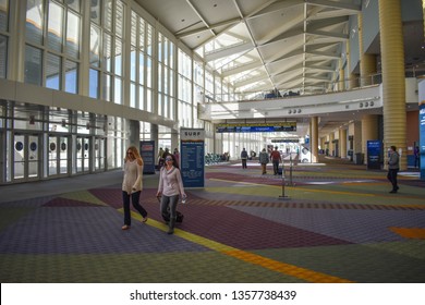 Orlando, Florida. January 12, 2019. People walking in Orlando Convention Center  at International Drive area (2)