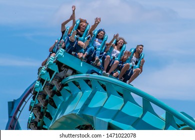 Orlando, Florida . July 31, 2019. People Enjoying Riding Kraken Rollercoaster During Summer Vacation At Seaworld 17.