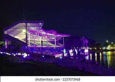 Orlando, Florida. November 17, 2018. Panoramic view of colorful stadium by the lake, when the show has finished at night in International Drive area.