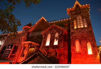 Orlando, Florida. October 31, 2018. Haunted House Attraction At Kissimmee Old Town At Night.