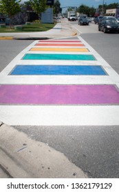 Orlando, Florida / United States - June 19, 2018 : Pulse Nightclub Interim Memorial Closeup Rainbow Crosswalk Looking North