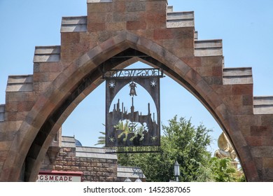 Orlando, Florida, USA, August 28, 2019: Hogsmeade's Facade Or Portal, Diagon Alley, Lined With Stores For Harry Potter Movies And Books. People. Food Court, Trade. Convenience.