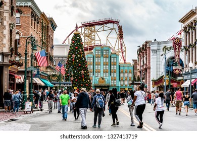 ORLANDO, FLORIDA, USA - DECEMBER, 2018: Christmas At Universal Studios Theme Park. Colorful Ornaments And Christmas Tree.