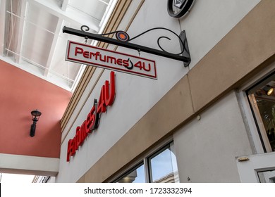 Orlando, Florida, USA - February 5, 2020: Perfumes 4U sign at Orlando Premium Outlets mall in Florida, USA. Perfumes 4U is an American a family-owned and operated perfume retail company. 