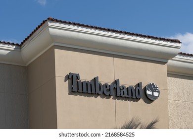 Orlando, Florida, USA - January 20, 2022:  The Timberland Store Sign On The Building At A Shopping Mall Is Shown. Timberland LLC Is An American Manufacturer And Retailer Of Outdoor Footwear.