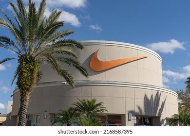 
Orlando, Florida, USA - January 20, 2022:  The Nike Logo On The Building At A Shopping Mall Is Shown. Nike Is An American Multinational Corporation. 
