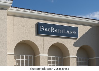 
Orlando, Florida, USA - January 20, 2022:  The Polo Ralph Lauren store sign on the building at a shopping mall is shown. Ralph Lauren Corporation is an American publicly traded fashion company. 
