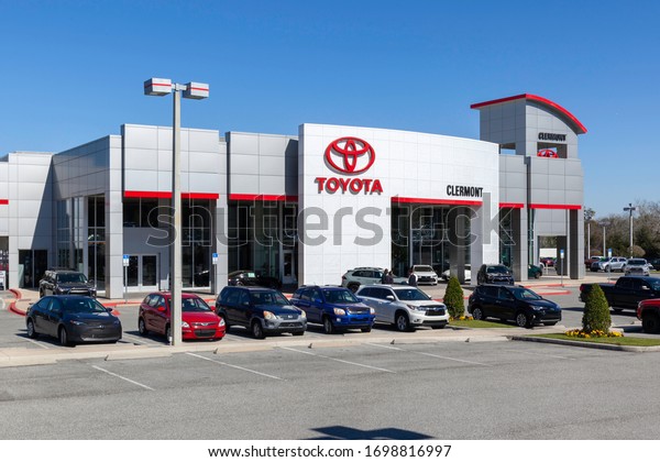 Orlando,\
Florida, USA - January 21, 2020: Exterior view of  Toyota car\
dealership in Orlando, Florida, USA. Toyota Motor Corporation is a\
Japanese multinational automotive manufacturer.\
