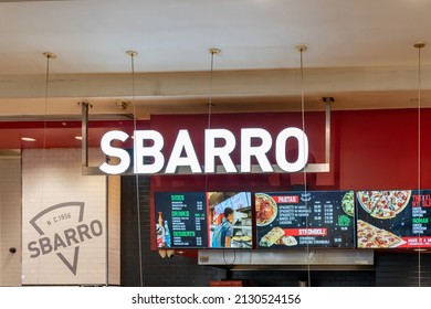 Orlando, Florida, USA - January  27, 2022: Sbarro food stand at Florida Mall’s food court in Orlando, Florida. Sbarro is an American pizzeria chain that specializes in New York-style pizza. 