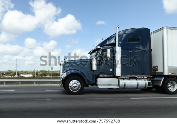 ORLANDO, FLORIDA, USA - MARCH 8, 2015:\
Truck on high way near Orlando in Florida, USA\
