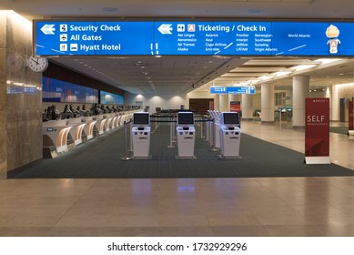 Orlando, Florida / USA - May 9, 2020 Empty Airline Terminal Check In Counters In The Orlando International Airport Amid The Cornavirus Covid 19 - Economic Pandemic Crisis And Slow Down 