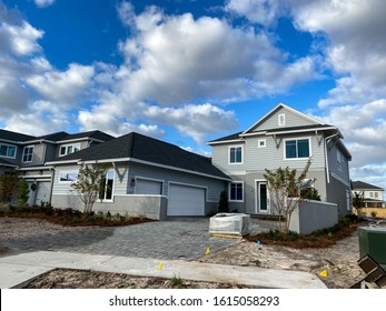 Orlando, FL/USA - 12/25/19: A New Home That Is Under Construction With Brick Pavers In The Driveway In Lake Nona Orlando, Florida.