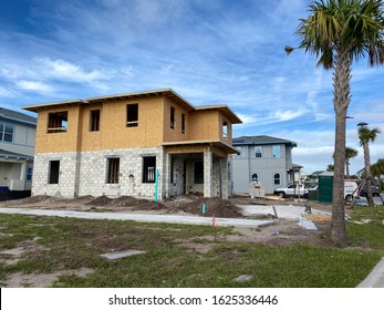 Orlando, FL/USA - 12/25/19: A New Home That Is Under Construction With Constuction Materials In The Front Yard In Lake Nona Orlando, Florida.