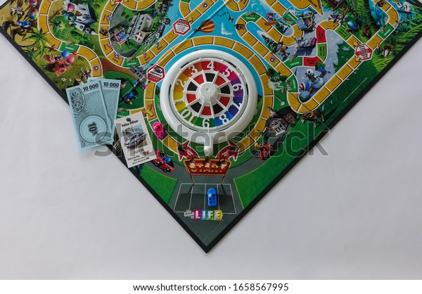 Orlando, FL/USA-2/12/20:  Game of Life by\
Hasbro with the career choice of going to college or not.  Concept\
career and life\
decisions.