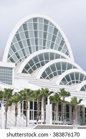 ORLANDO, USA - FEBRUARY 23, 2016: The south concourse of the Orange County Convention Center features beautiful state-of-the-art architecture amidst of landscape of palm trees.