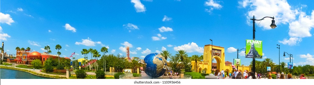 Orlando, USA - May 8, 2018: The People Going To Main Entrance To Park Universal Studios. Universal Studios Is One Of Orlando Famous Theme Parks.