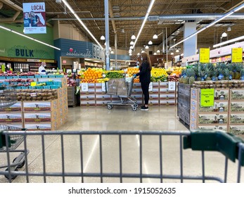 Orlando,FL USA - January 18, 2021:  The Produce Aisle With A Cart Point Of View Of A Whole Foods Market Grocery Store In Orlando, Florida.