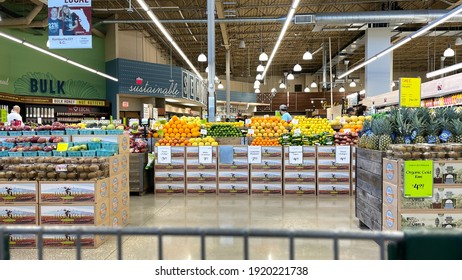 Orlando,FL USA - January 18, 2021:  The Produce Aisle With A Cart Point Of View Of A Whole Foods Market Grocery Store In Orlando, Florida.