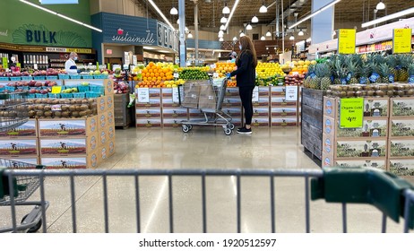 Orlando,FL USA - January 18, 2021:  The Produce Aisle With A Cart Point Of View Of A Whole Foods Market Grocery Store In Orlando, Florida.