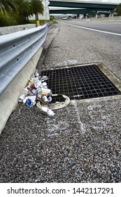                  Orlando,Florida June 2019,Trash In Storm Drain Grate              