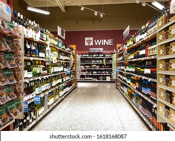 Orlando,FL/USA -1/15/20:  The Wine Aisle Sign At A Publix Grocery Store With A Variety Of Wines From Various Vineyards.