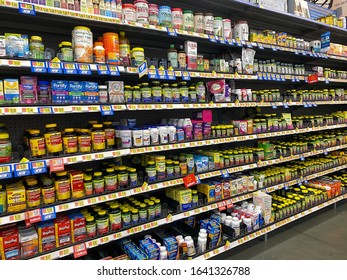 Orlando,FL/USA -2/6/20:  The Vitamin And Supplement Aisle Of A Walmart Superstore With A Variety Of Supplemental Pill And Capsule Products From Various Manufacturers.