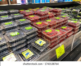 Orlando,FL/USA -5/10/20:  Boxes Of Raspberries And Blueberrie At The Fresh Produce Aisle Of A Whole Foods Market Grocery Store.