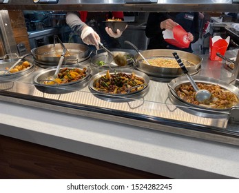 Orlando,FL/USA-10/2/19: Panda Express Chinese Fast Food Restaurant Employees Waiting On Customers.