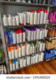 Orlando,FL/USA-12/13/19: Shelves Of Paul Mitchell Hair Shampoo, Conditioner And Styling Products At A Supercuts Hair Salon.